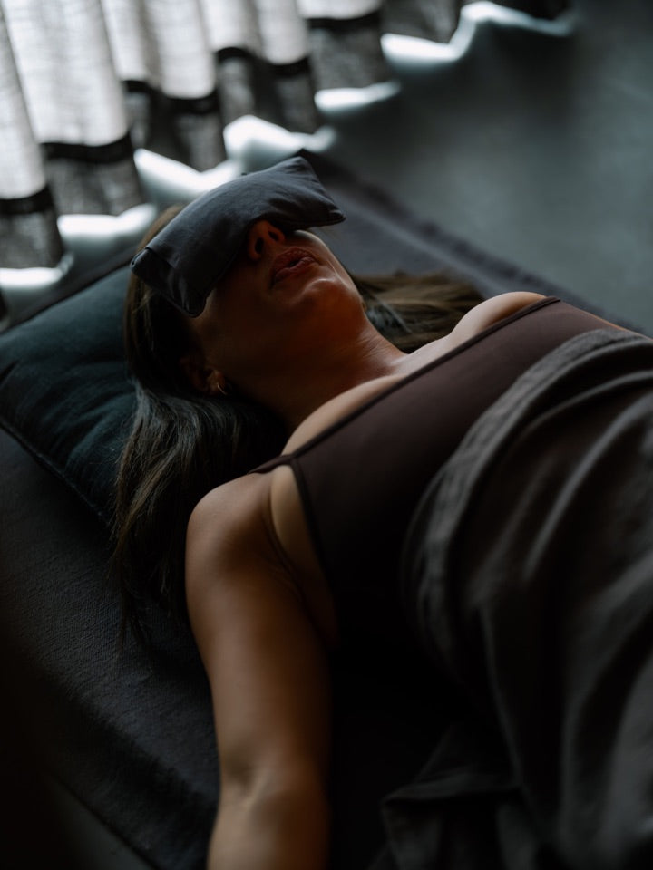 A participant lying down during an experience