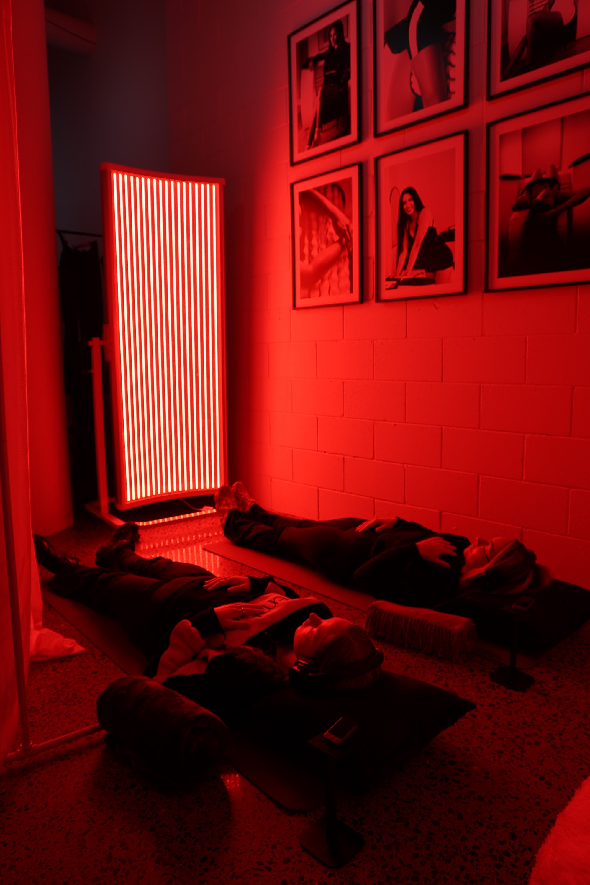 The Wellness Flow room glowing in warm light