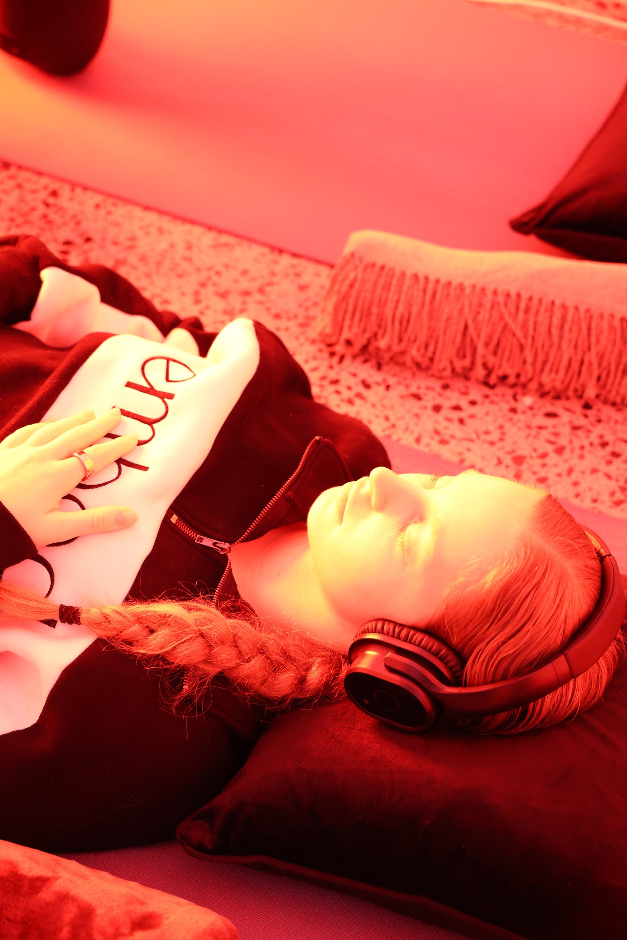 Resting under warm light during a Wellness Flow